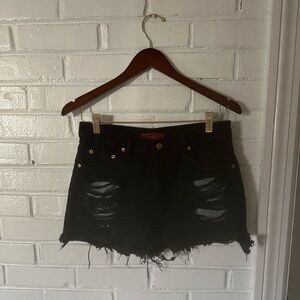 Black ripped Jean shorts. Size M